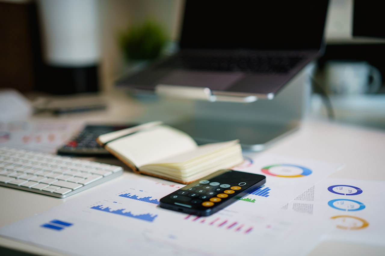 A finance workspace with statements. Illustrative photo.